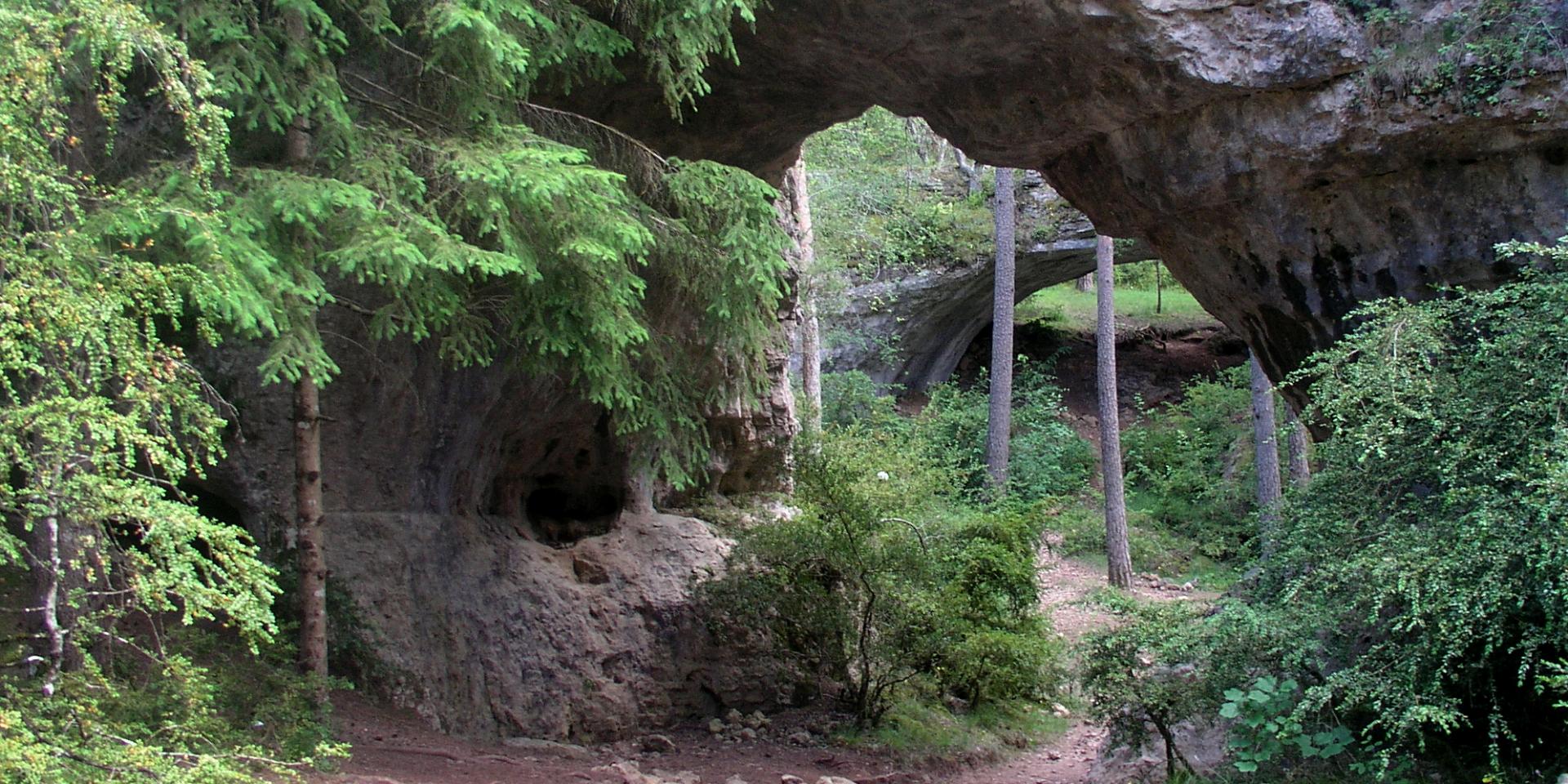 Les Arcs de Saint Pierre on the Causse Méjean. Limestone arch on a hiking trail called 