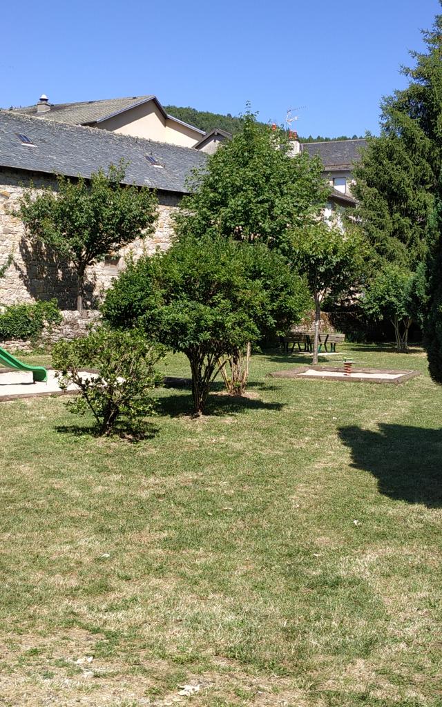 Playground and picnic area at La Canourgue in the new street beside the Urugne river