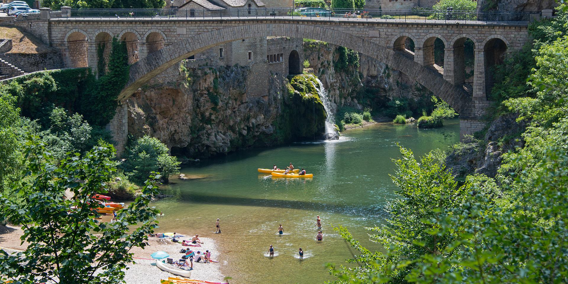 Bridge and waterfall at Saint-Chely du Tarn in the Gorges du Tarn