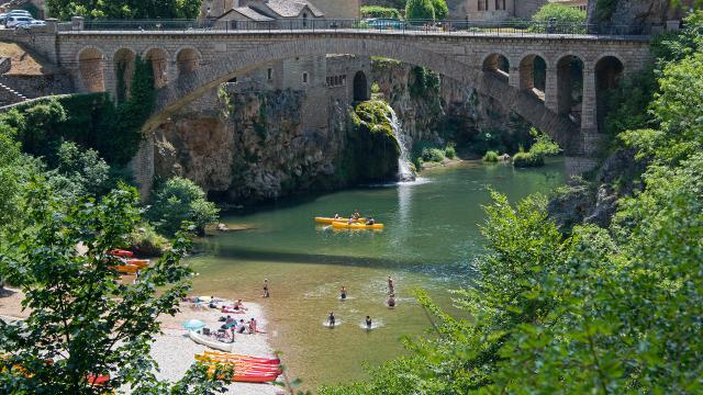 Bridge and waterfall at Saint-Chely du Tarn in the Gorges du Tarn