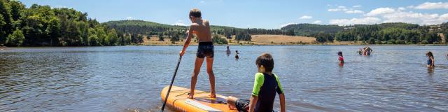 Swimming and paddle-boarding on Lac du Moulinet.